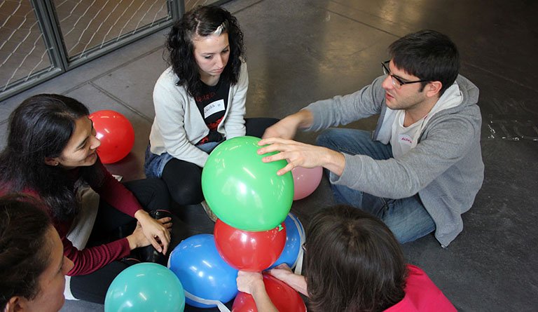 Students With Balloons In A Classroom