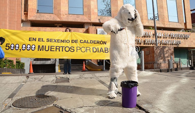 Coca Cola Polar Bear Pouring Soda Into Trashcan
